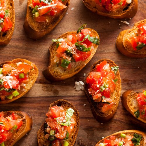 Homemade Italian Bruschetta Appetizer with Basil and Tomatoes